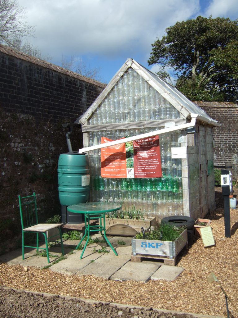 Greenhouse made from bottles with water butt