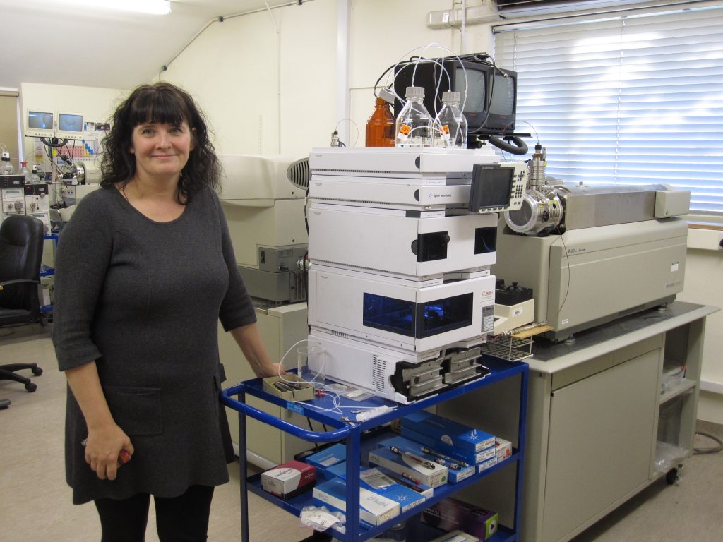 Wendy with masspectrometer at the Rowett Institute of Nutrition and Health that has been used to analyse the chemical profiles of the crops for compounds linked to maintaining health.