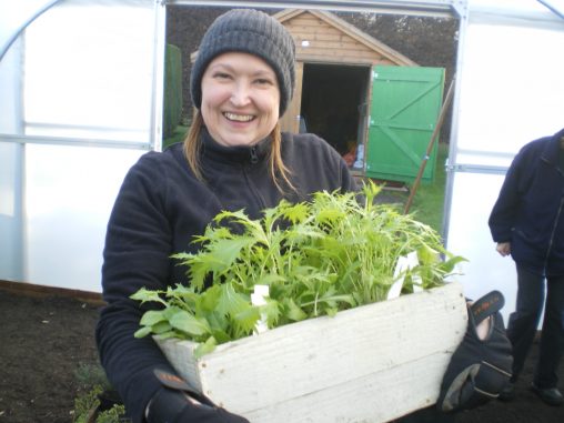 nadia with a winter vegetable window box