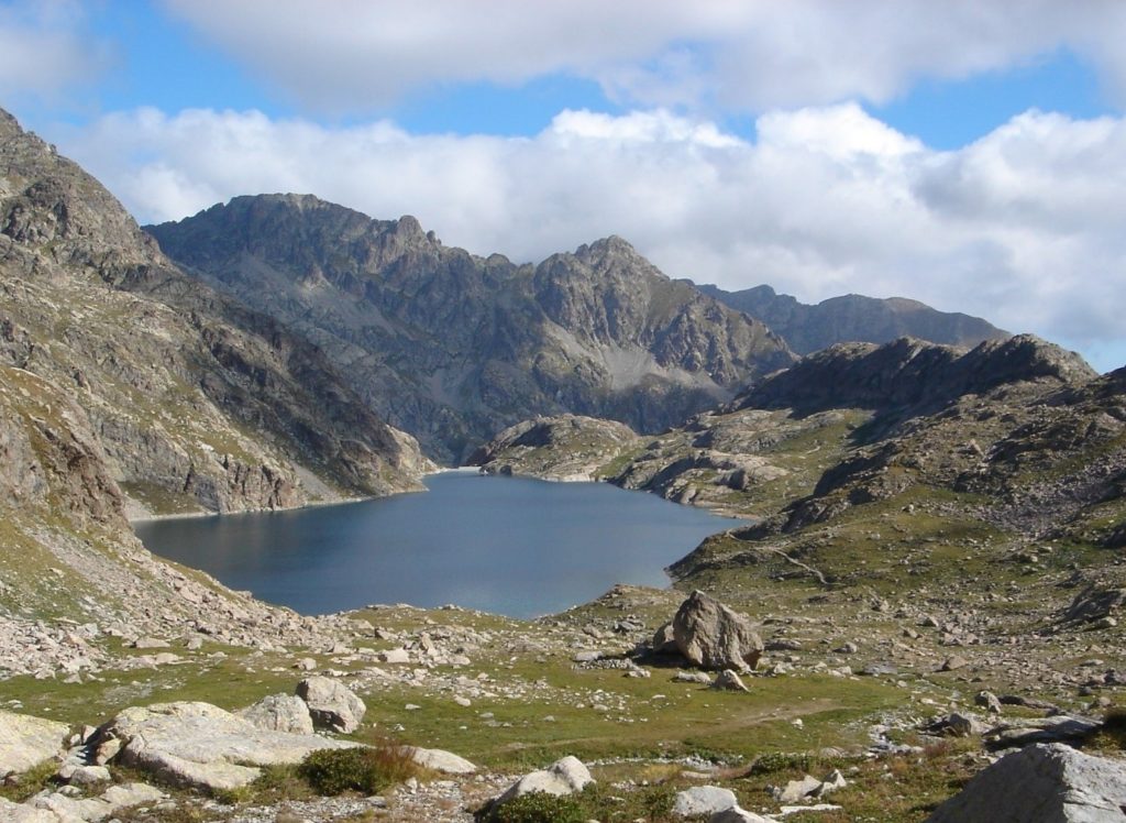 photograph of a lake in the mountains