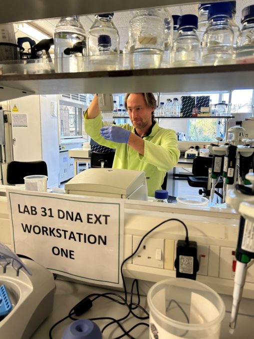 Man in lab doing DNA extraction